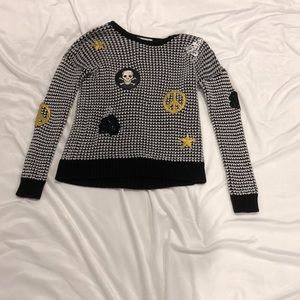 A kids black and white comfy sweatshirt